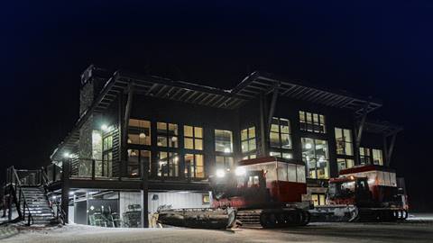 snow cat in front of Sky House