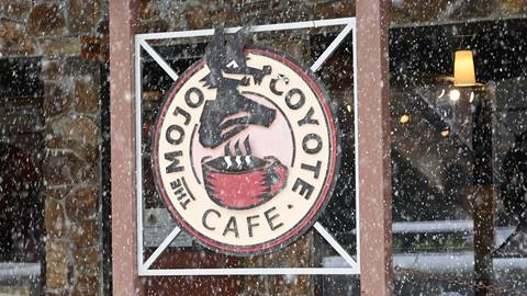 Mojo Coyote Cafe sign snow