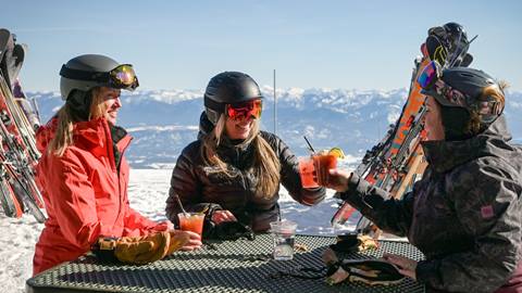 Friends enjoying drinks at Sky House