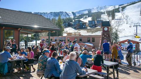 Taps deck filled with people on a sunny spring day