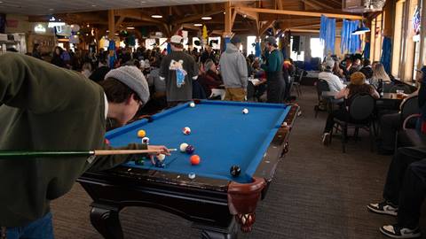 People shooting pool at Taps Bar