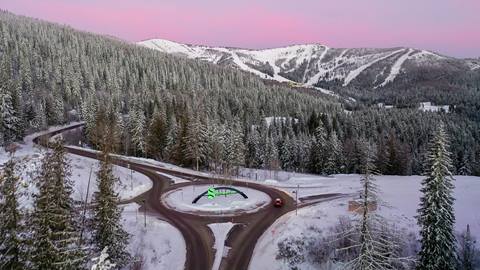 View of big Schweitzer sign and mountain at sunrise