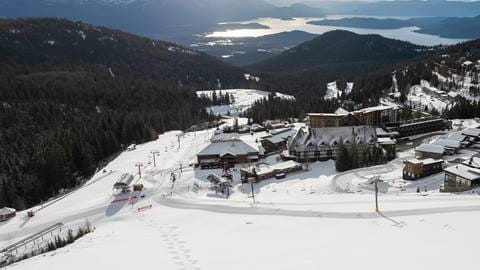 Drone view of Schweitzer Village and the beginner area on the left. Lake view too. 