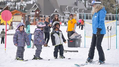 3 young skiers taking a beginner lesson at Schweitzer. 