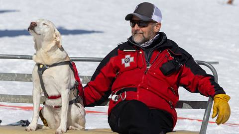 Schweitzer Ski Patroller with his happy avy dog Annie. 