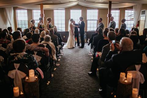 Wedding ceremony with bride, groom and family in the Caribou Room at Schweitzer