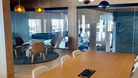 Long table and chairs at the Coworking Space in Humbird at Schweitzer