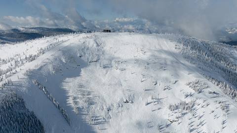 Drone view of the Outback Bowl and Sky House at the summit of Schweitzer. 