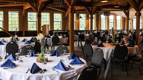 North Room set up with round tables for a wedding reception at Schweitzer