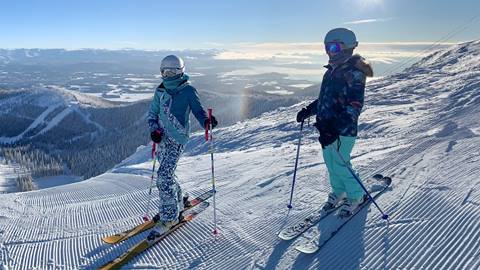 two kids skiing at the top of Schweitzer in ID