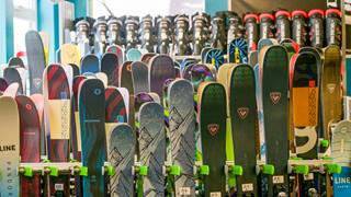 variety of skis in rental shop